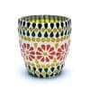 Мозаечен Стъклен Свещник зелено/жълто е жива керамична саксия с мозаечен модел с червени цветя, златни точки и черни капковидни форми на бял фон.