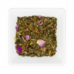 A square white dish holds an assortment of "Разкрасяване" Органик dried herbal tea leaves and flower petals.